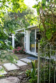 Tennis Cottage - Surrounded by a verdant garden. - Image 2