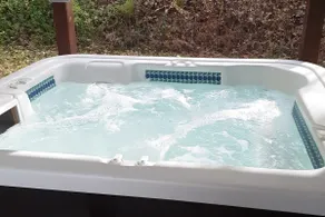 Magnolia Cabin • Hot tub in the Ozarks - Image 2
