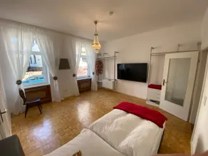 City apartment surrounded by greenery - Image 3