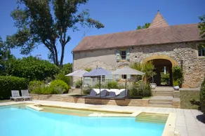 Stone barn with a swimming pool and lake. - Image 2