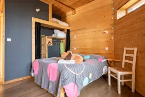 Wooden and straw house on stilts. - Image 4