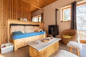 Wooden and straw house on stilts. - Image 3