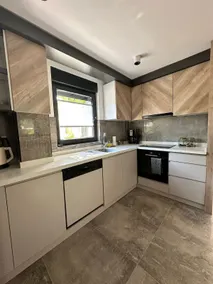 Full Equipped 2BR Cozy Apartment with Garden - Image 2