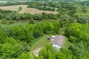 Secluded 3 bedroom bungalow on the Saugeen River with 85-acres. - Image 3