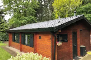 Wooden cottage in a quiet holiday park. - Image 2