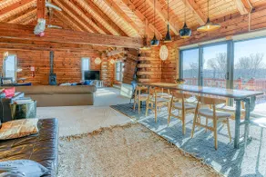 Moderne, Artsy, & Lofty Log Home - Image 5