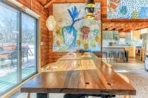 Moderne, Artsy, & Lofty Log Home - Image 2