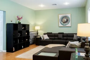 Cozy 3-Bed 2-Bath Condo | Parking and Laundry! - Image 3