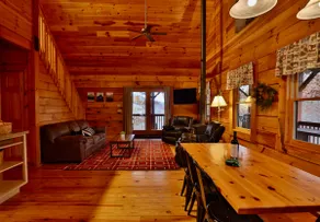 Cozy log cabin with hot tub and view of the forest - Image 3