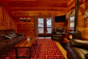 Cozy log cabin with hot tub and view of the forest - Image 2