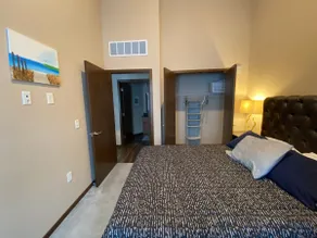 Vaulted Penthouse with Private Balcony - Image 5