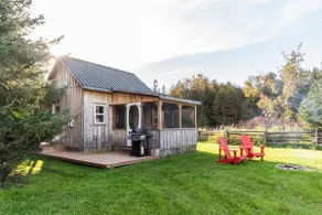 Cozy Countryside Cabin | Outdoor Shower - Image 3