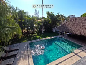Steps from the beach, pool, games room and privacy! - Image 3