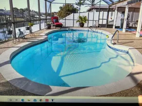  Canal Home 3Br 2BA with Salt Water Heated Pool and Boat DockDiscounts Available - Image 2