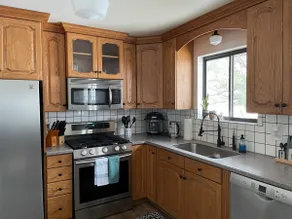 King Bed | Private Garage | Full Kitchen | 75in TV - Image 4