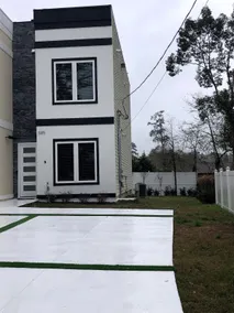 Newly constructed modern home with luxurious rooftop patio - Image 2
