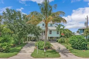 Beautiful waterfront Key West style home with a pool - Image 3