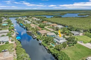Beautiful waterfront Key West style home with a pool - Image 2
