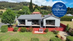 Huon Honeymoon Suite · Boat Reflections - Image 2