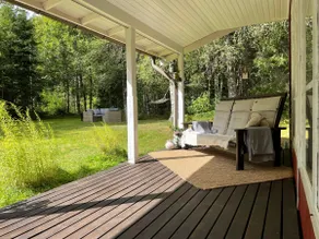 Cabin with a unique location in the forest by a lake. - Image 3