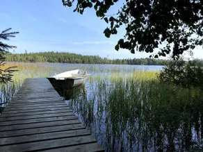 Cabin with a unique location in the forest by a lake. - Image 4