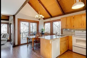 A warm mountain top home, steps from the slopes. - Image 4