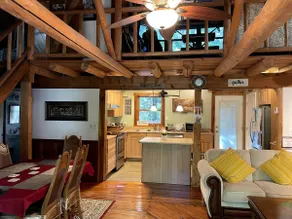 A charming cedar log cabin tucked in the woods. - Image 5