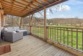 Lazy River Lodge- Sleeps 8, arcade, putting green! - Image 4