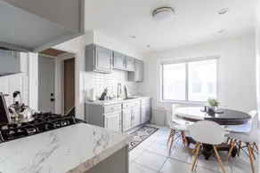 FamilyFriendly 5BR Home w/Yard Theater by LI Ferry - Image 4