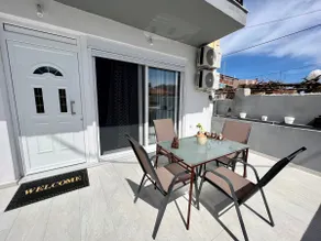 Holiday Base | 20m from Stalos Beach | Patio - Image 2