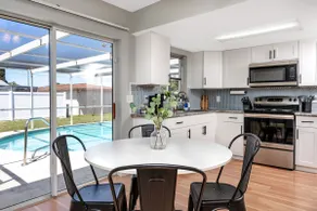 Sunny Escape: Vibrant Pool Home - Image 5