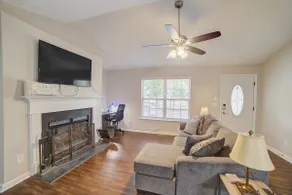 Cozy 4-bedroom home with indoor fireplace and deck - Image 3
