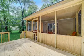 Cozy 4-bedroom home with indoor fireplace and deck - Image 2