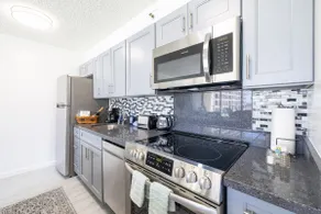 Steps to Waikiki Beach: Stylish 1BR with Parking! - Image 3
