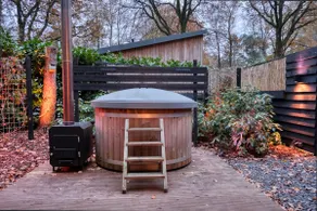 Lodge in a wooded area with Hottub & Sauna - Image 3