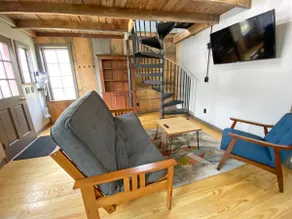 Cozy 2BR with Rustic Decor Near Downtown - Image 3