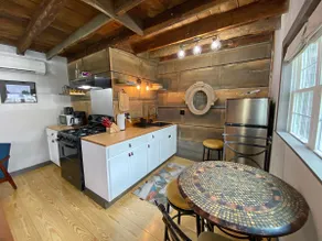 Cozy 2BR with Rustic Decor Near Downtown - Image 4