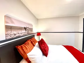 Classy 1-Bedroom Nguni Guesthouse with Parking - Image 4