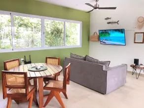 Bright Modern 2BR at TAO | Pools, Gym, Fast WiFi - Image 2