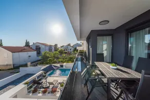 Apartment Laverna 40m from the beach, heated pool - Image 5