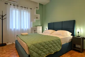 Cozy Apt in Ilisia with Urban Forest View - Image 3
