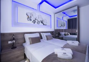 TWIN'S HOME LUXURY SUITES - Image 4