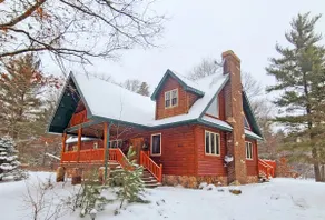 Luxury Family Cabin in a forest with a private pond - Image 2