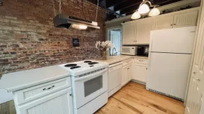 The Lofts at Court Sq Abbeville King Suite - Image 4