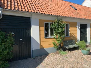 Farmhouse in Laholm's old town center with the river next to it - Image 4