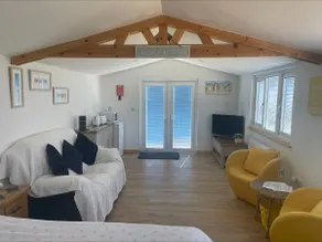 Luxury Coastal Garden Lodge • Walk to the Beach - Image 2