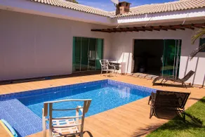 Lakeside house with pool and barbecue area - Image 3