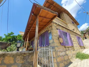 Kaz Mountains & Sea: Bohemian Design House with Purple Shutters - Image 2