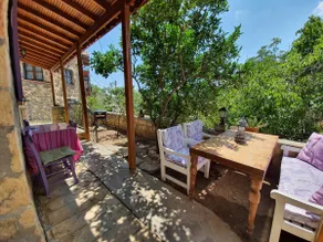 Kaz Mountains & Sea: Bohemian Design House with Purple Shutters - Image 5