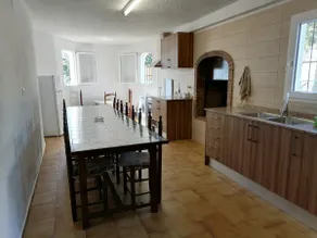 A villa (ground floor) with a swimming pool and tennis court. - Image 5